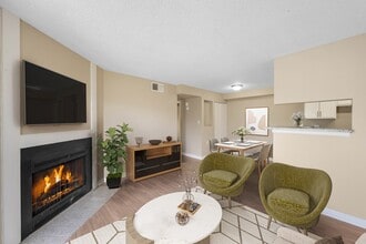 Spacious Living Room with Fireplace - Bella Terra at City Center Apartments