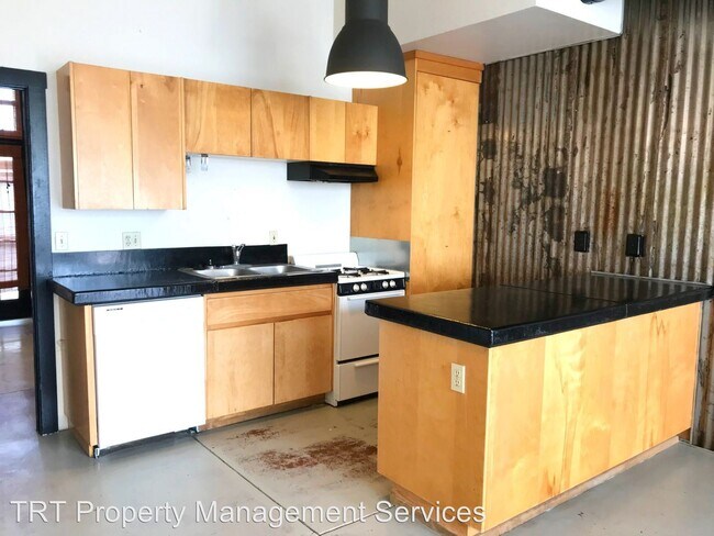 Foto del edificio - 711-715 E 9th St