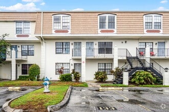 Building Photo - 6095 Village Cir N