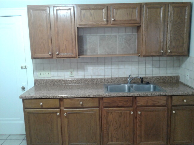 Updated eat-in kitchen. - 1673 Victoria Ave