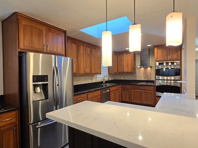 Building Photo - Large Campbell Home, Remodeled Inside, Gorgeous Kitchen, Large Master Suite, Beautiful Yards!