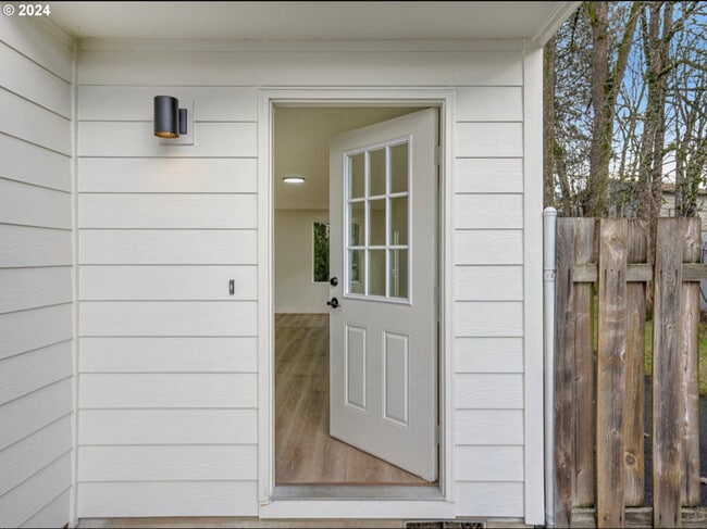 Photo - 902 NE Hacienda Ct Townhome