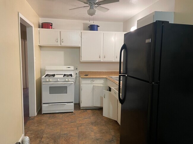 Kitchen is large for cooking for family! - 102 E Ball Rd