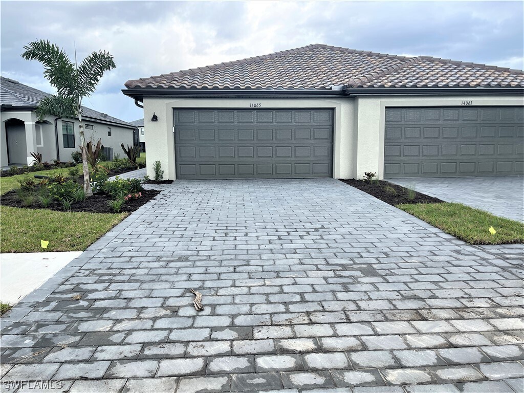 14065 Winding Cedar Wy, Miromar Lakes, FL 33913 Condo for Rent in