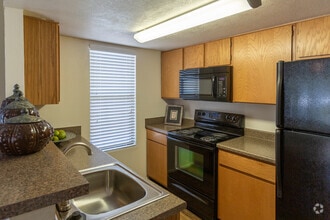 2BR, 2BA 986SF - Countryside Village Apartments