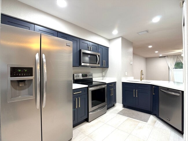 Photo - Water and Lawn Care Included! Beautiful Corner-Lot Duplex Condo in a Resort-Style Golf Community!