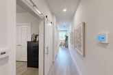 Located at 1505 Oliver St in Houston, TX, this single-floor, one-bedroom, one-bathroom residence offers a thoughtfully designed layout that maximizes every square foot. Light wood-style flooring flows consistently throughout the space, creating a cohesive and airy feel.

The open-concept living and dining area connects seamlessly to the kitchen, which is outfitted with gray shaker-style cabinetry, granite countertops, a subway tile backsplash, and a full suite of stainless steel appliances including a refrigerator with ice maker, range, microwave, and dishwasher. Recessed lighting illuminates the space from above.

A well-lit hallway, accented by a stylish sliding barn door, leads to the private areas of the unit. The bedroom is a comfortable retreat featuring a ceiling fan, generous closet space, and neutral tones. The bathroom includes a gray vanity with a granite countertop, a tub-shower combination with marble-style tile surround, and wood-look flooring.

Additional functional spaces include a dedicated laundry area, a pantry, three closets, and an entrance foyer. The clean, modern aesthetic is carried throughout, making this a practical and attractive residence in the heart of Houston.