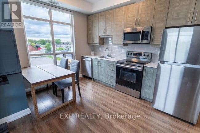 Building Photo - 6289 McLeod Rd