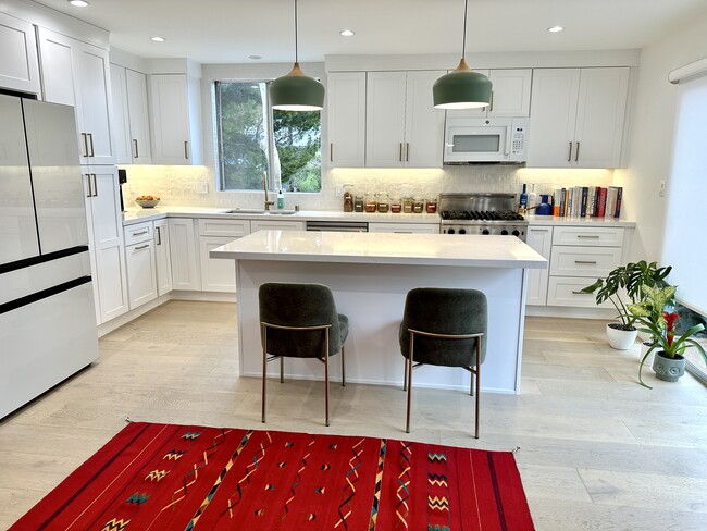 New hardwood flooring throughout unit - 630 Raymond Ave