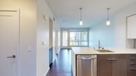 This contemporary 630 square foot apartment in Irvine, CA, offers a harmonious blend of style and functionality. The open-plan design seamlessly integrates the living room and kitchen, creating a spacious feel. The gourmet kitchen boasts sleek cabinetry, stainless steel appliances, and a convenient kitchen island, perfect for casual dining or entertaining.

The bedroom, measuring 150 square feet, features plush carpeting and a large window that floods the space with natural light. The bathroom is generously sized, with modern fixtures and ample storage. A standout feature is the balcony, offering urban views and an outdoor extension of the living space.

Throughout the apartment, you'll find high-quality finishes, including hardwood-style flooring in the main living areas and recessed lighting. The in-unit laundry adds convenience to this already well-appointed home. With its thoughtful layout and contemporary aesthetic, this apartment maximizes every inch of its 630 square feet, providing a comfortable and stylish living environment in the heart of Irvine.