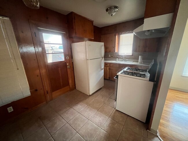 Kitchen view with some cabinetry in view - 3103 Burleson Rd