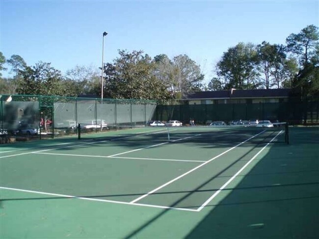 Building Photo - Residence at Whispering Pines Condominium