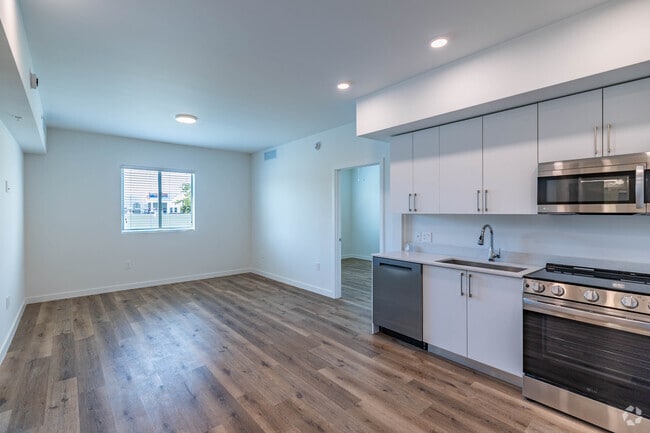 2BR, 2BA - 910SF - Living Room/Kitchen - Adrian Builders at Eureka-18305 &amp; 18355