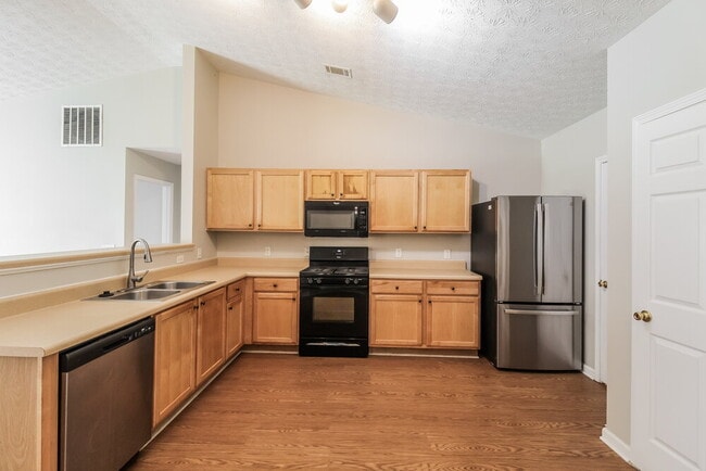 Foto del edificio - 3110 Cooper Woods Dr