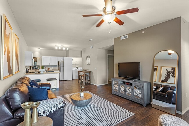 Experience the blend of modern design and comfort in this open-concept living space. - Fairways at Lincoln