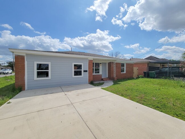 Building Photo - This beautifully updated 4-bedroom home is just under two miles from Highway 288 and Loop 610, ma...