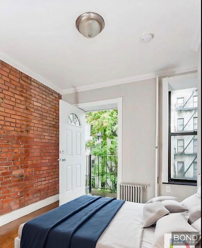 Foto del edificio - 422 E 9th St