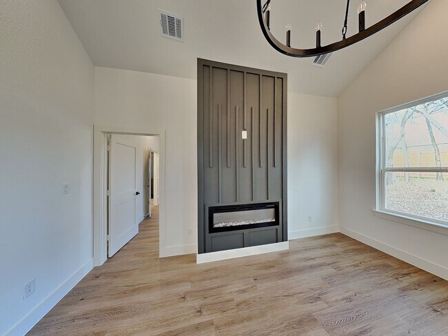 Building Photo - Brand New Modern Luxury with Soaring Ceilings & Designer Finishes!