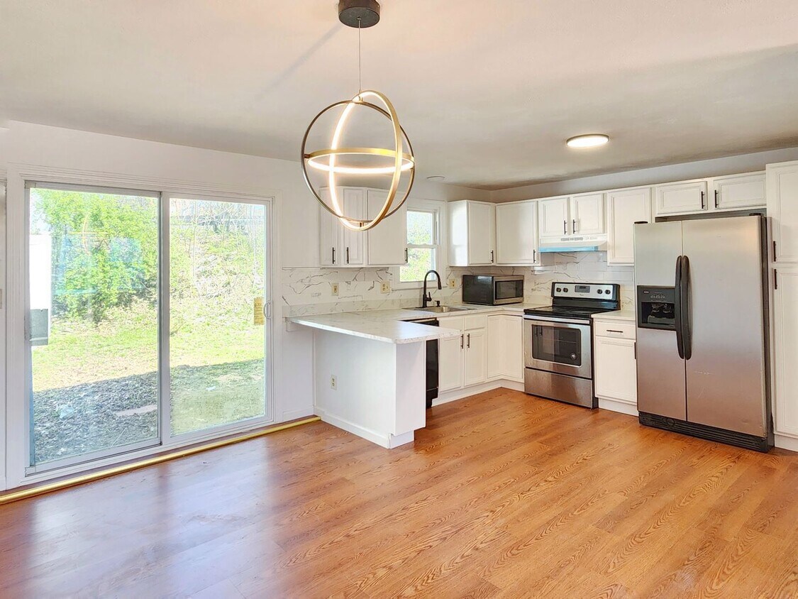 Primary Photo - Beautifully remodeled townhouse with garage.
