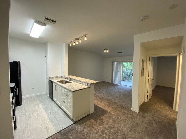 Foto del edificio - ** FULLY RENOVATED ** Large 1/1 Condo located in Cypress Fairway near Mall at Millenia and Univer...