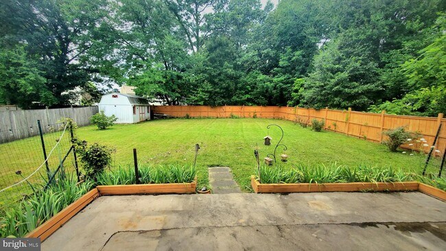 Building Photo - 7810 Muncaster Mill Rd