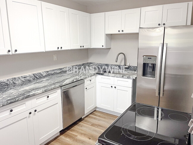 Building Photo - NEW Lower Rental Rate Leasing Special: Mar...