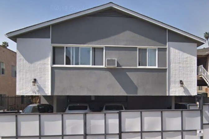 Street view of building. - 1631 N Harvard Blvd