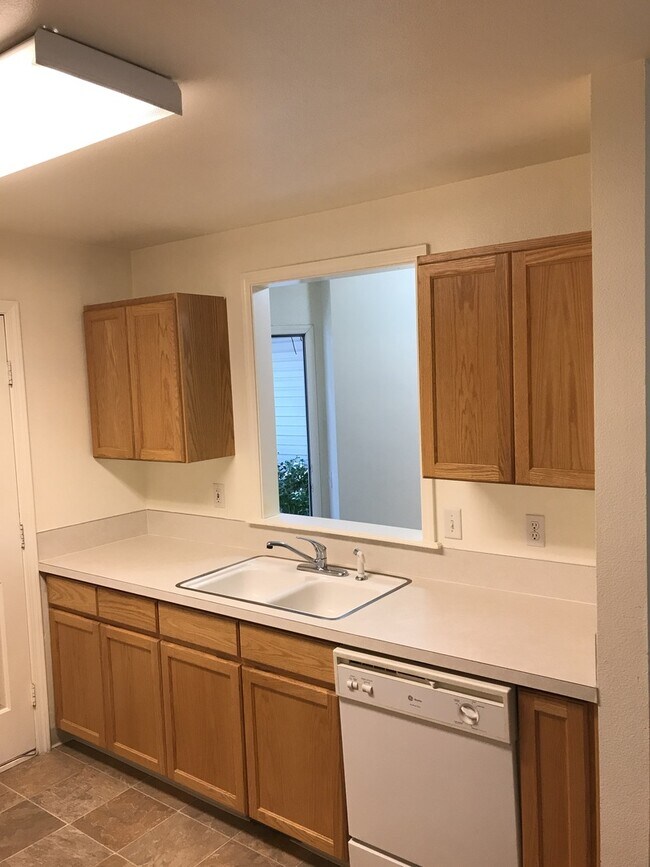 Building Photo - 2 bedrooms 1.5 bathroom with large living room, large kitchen PLUS 1 car garage. Bedrooms are huge