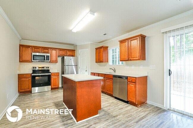 Foto del edificio - 5728 Hidden Lake Dr