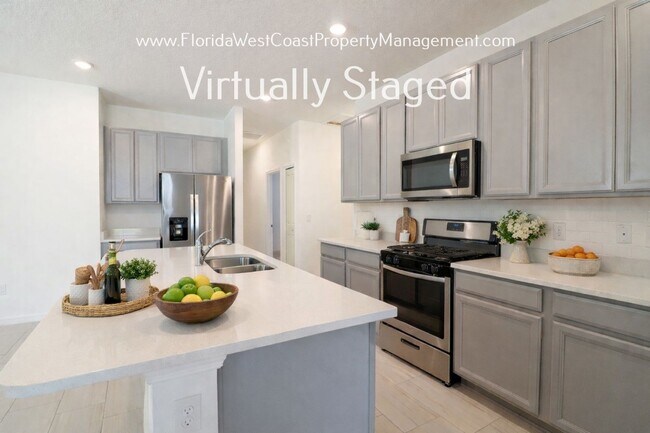 Building Photo - OUTSTANDING 3 BEDROOM/2 BATH IN EAVE'S BEND/ARTISAN LAKES PALMETTO!