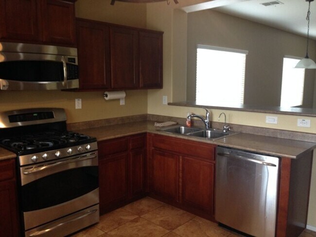 Building Photo - COMING SOON! Fireside at Norterra Spacious...