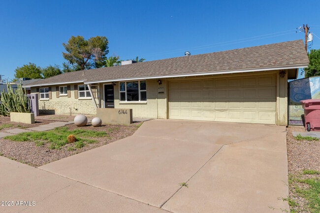 Building Photo - 6744 E Vernon Ave