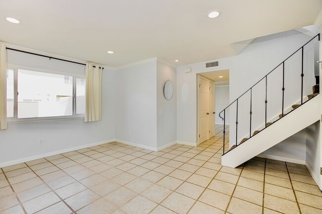 Building Photo - Spacious Anaheim Townhome Near Anaheim Coves with Community Pool & Clubhouse