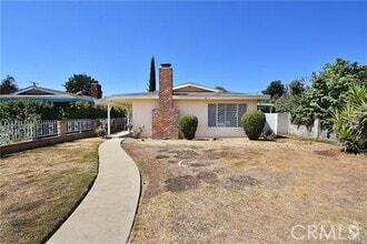 Building Photo - 4945 Persimmon Ave
