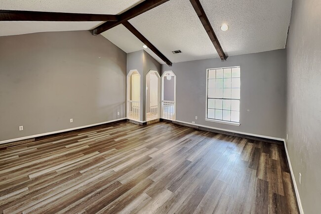 Building Photo - Darling Fort Worth Duplex! Vaulted Ceilings, Wood Beams & Covered Outdoor Living!