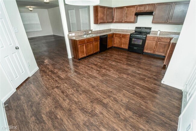 Foto del edificio - 4 br, 2.5 bath House - 5606 Rocky Trail Dr