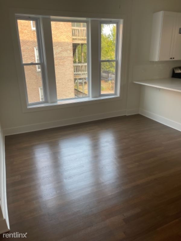 Building Photo - 3 br, 2 bath Condo - 1439 E 66th Pl