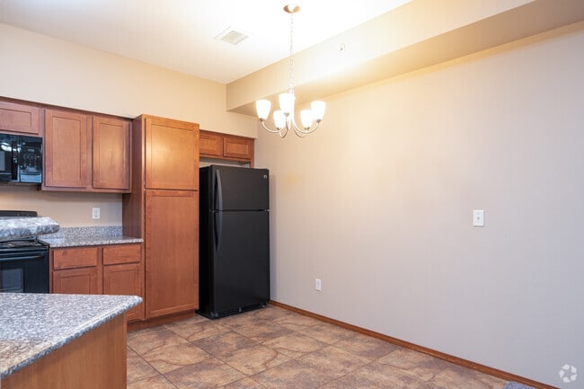 3BR, 2BA - 1,200SF - Dining Room - Healing Stone Court Apartments