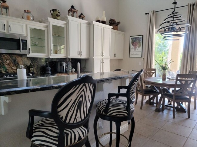 Building Photo - Fully Furnished Executive Rental in Highly...