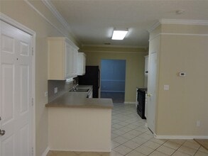 Building Photo - 9116 Dolphin Cir