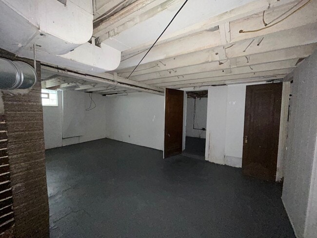 Building Photo - "Charming 4-Bedroom Oasis: Your Perfect Bl...