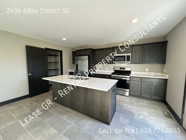 Building Photo - New 4 Bedroom Duplex in Caledonia!