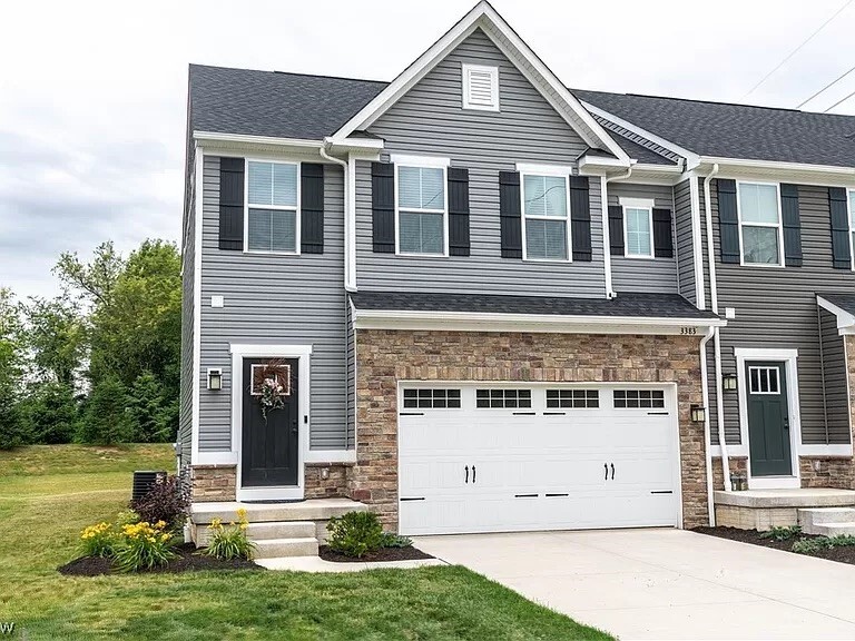 Beautiful stone/siding exterior 2 car attached garage. - 3383 Jackson Park Dr NW