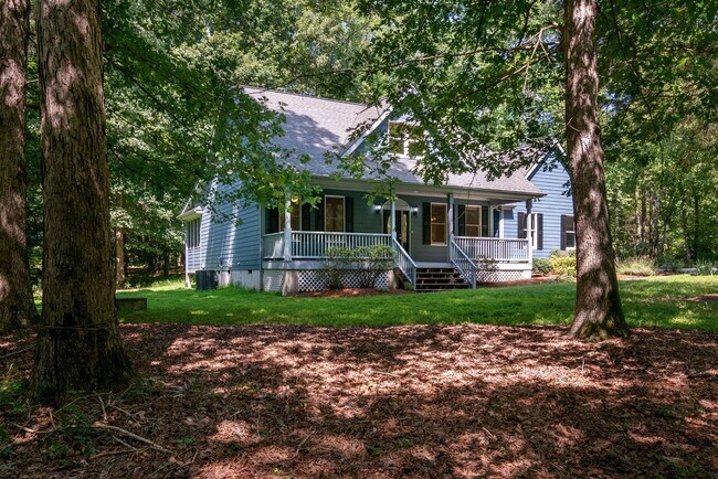 Building Photo - Spacious 3BR/2BA Ranch with Acreage Minute...