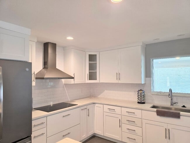 Building Photo - Beautiful waterfront property in Woodland Estates.