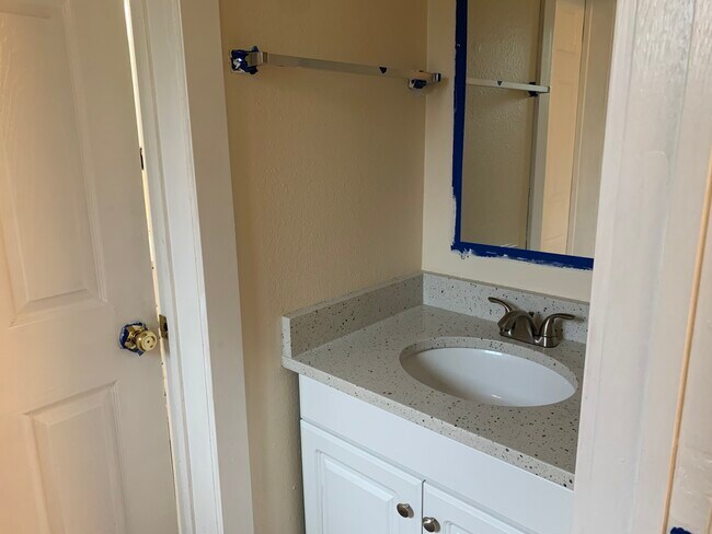 1/2 bath connected to bedroom - 923 Marie Pl