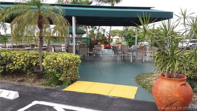 Building Photo - 6570 Royal Palm Blvd