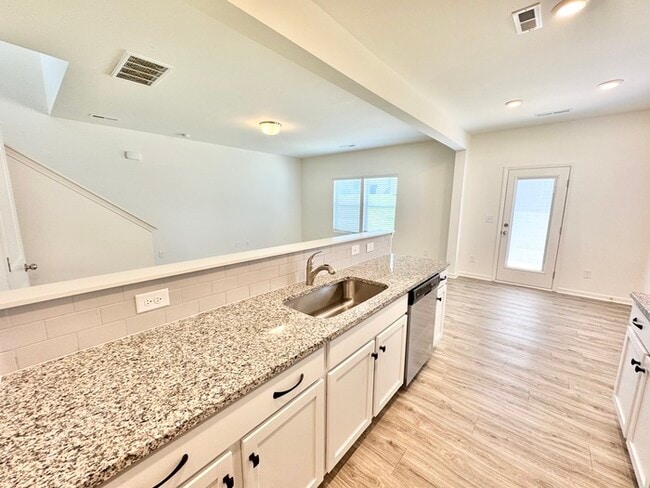 Building Photo - Three bedroom 2 1/2 bath paired home. Clos...