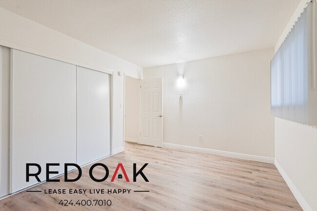 Building Photo - Serene Two Bedroom with an Included Stove/...