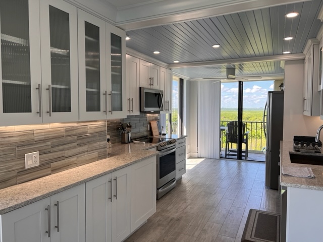 Kitchen wood slated ceiling - 5055 N Highway A1A